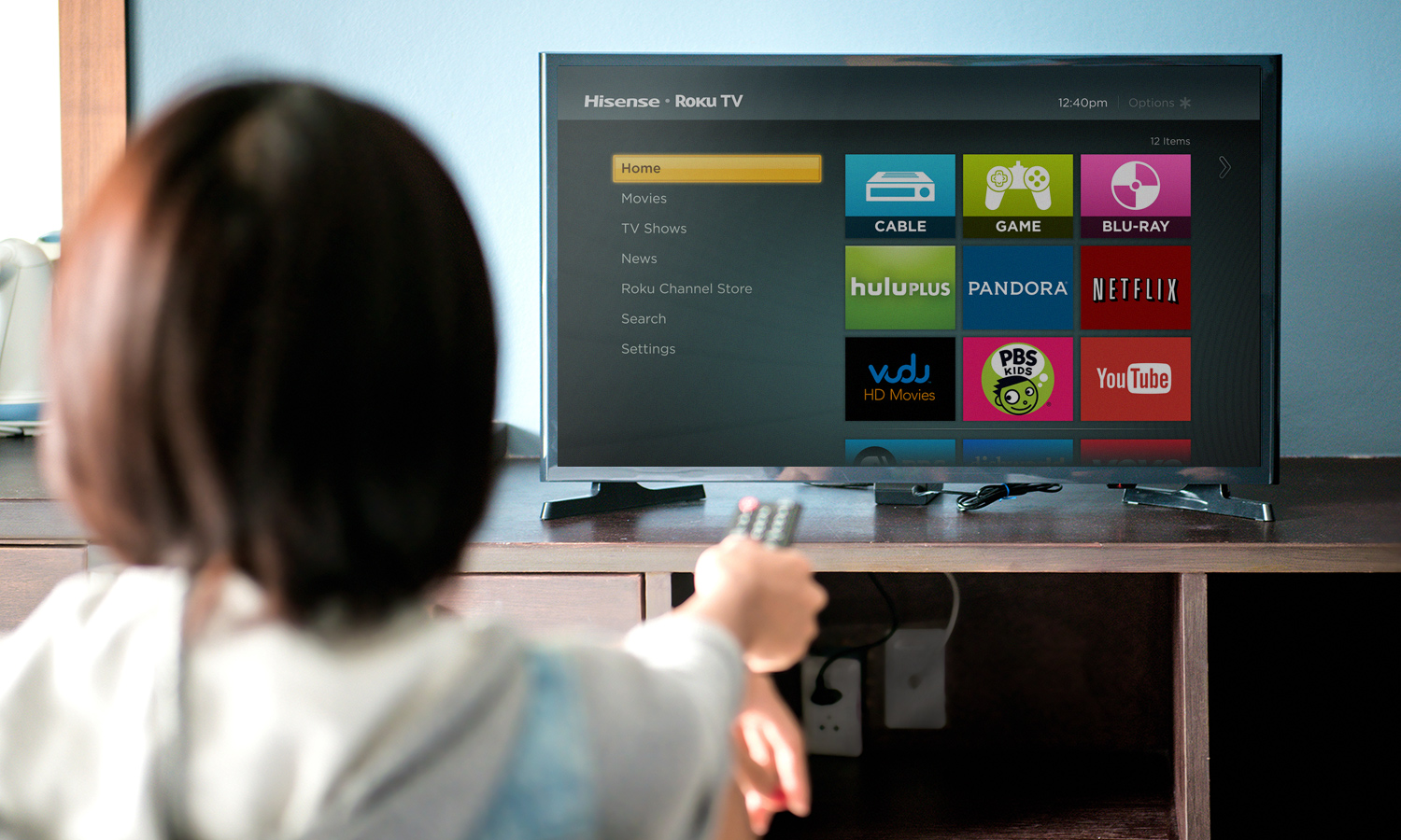 Family using internet and streaming TV at home