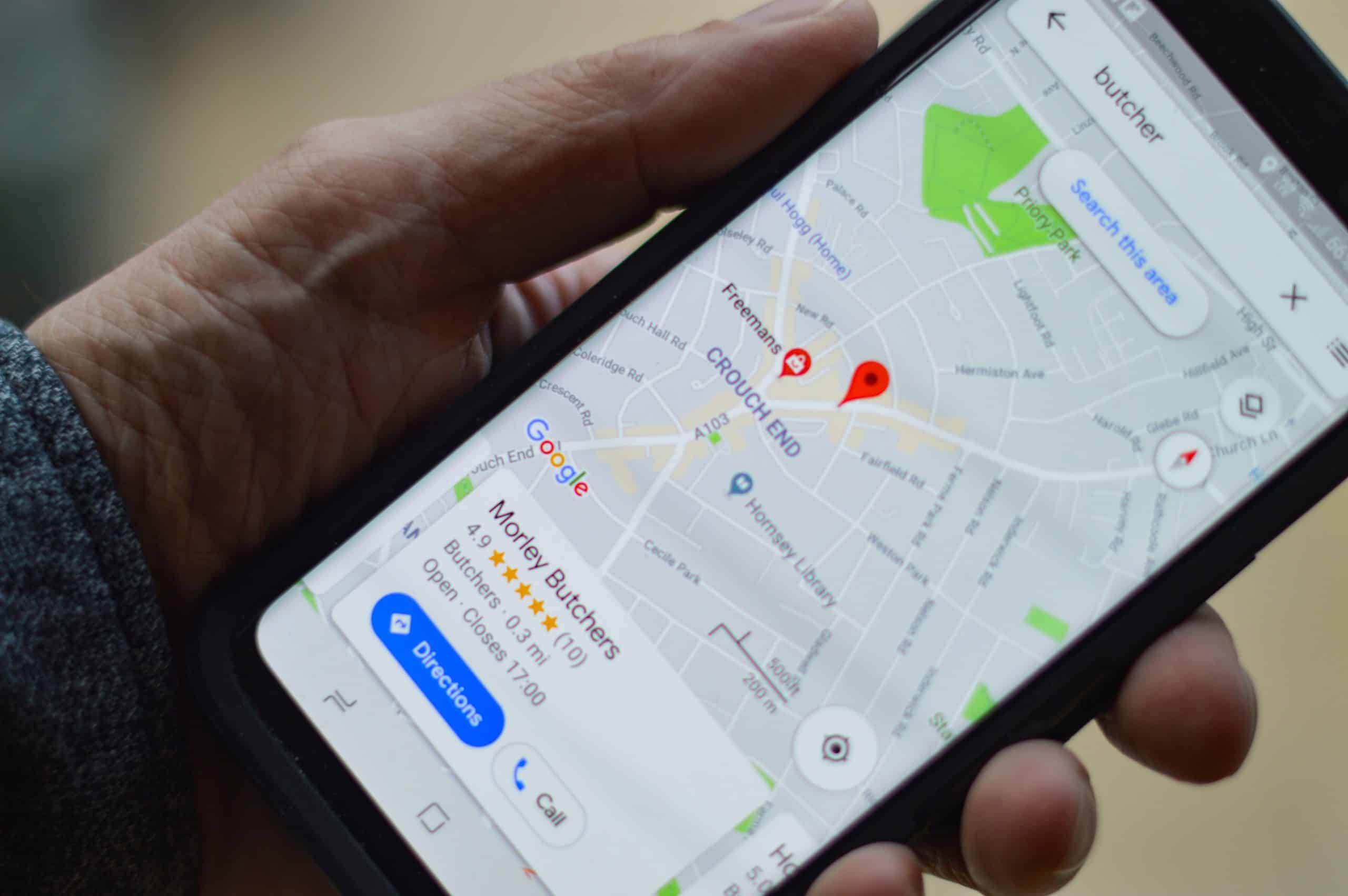 Person checking address on a phone
